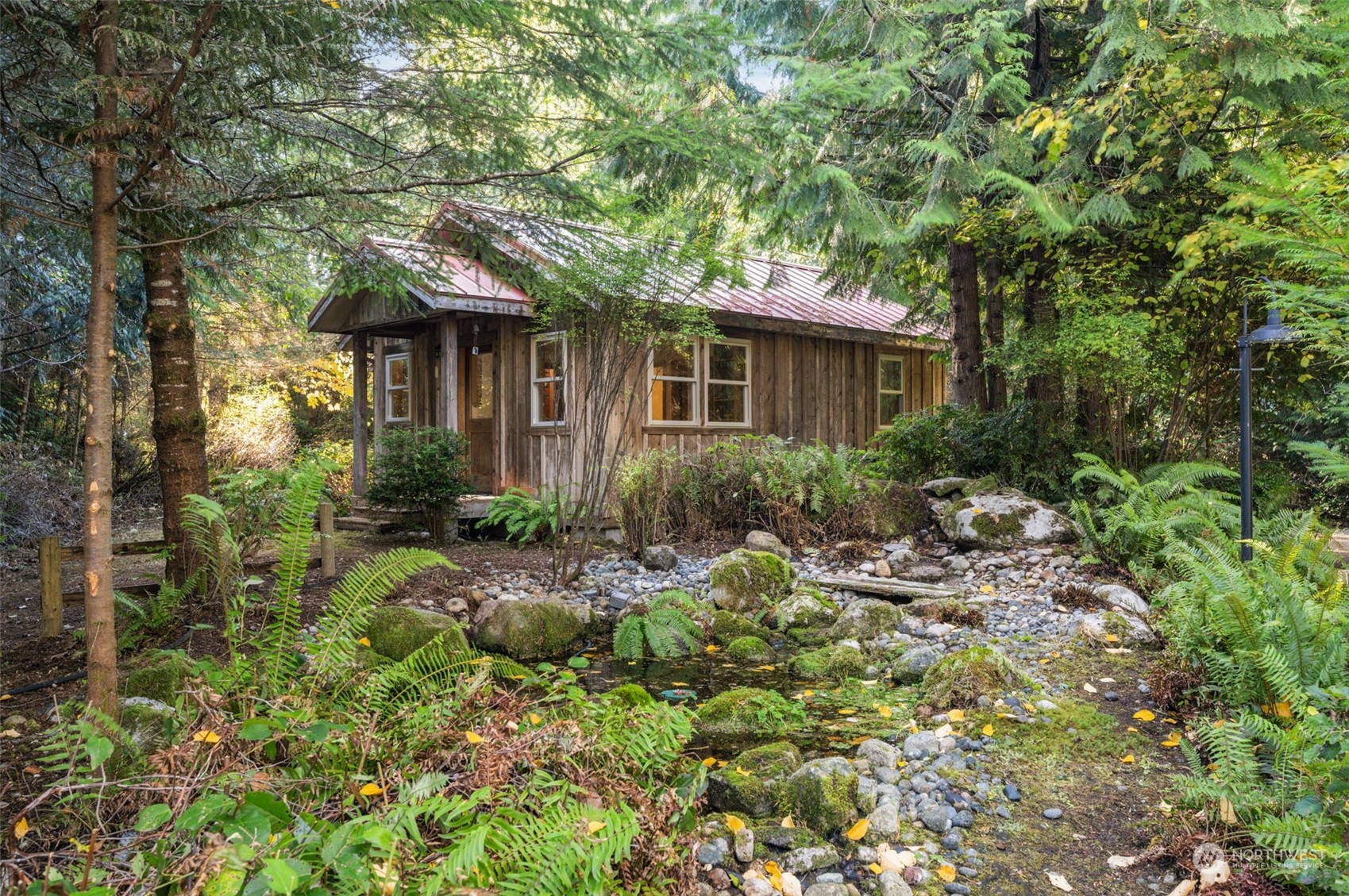 23406 Landers Road Southwest Vashon, WA 98070 - Photo 21 of 39 a front view of house with yard and green space