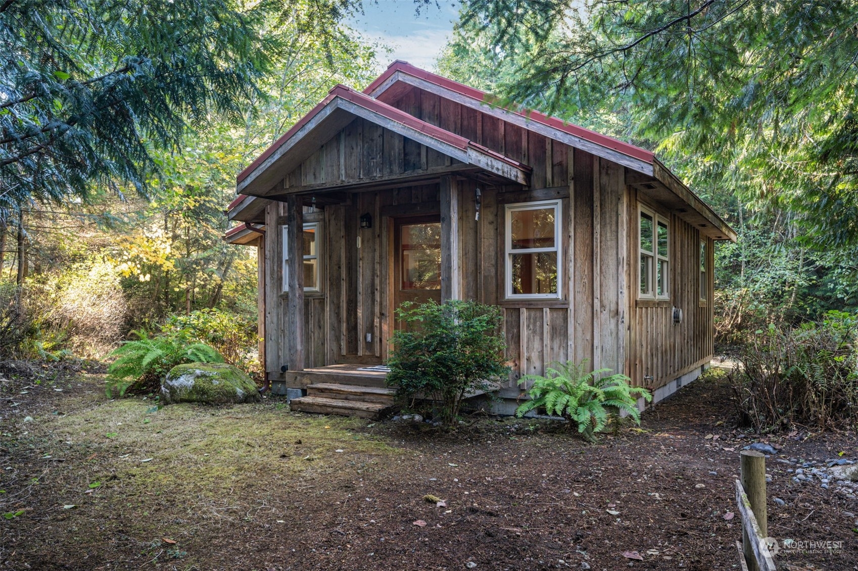23406 Landers Road Southwest Vashon, WA 98070 - Photo 22 of 39 a front view of a house with garden