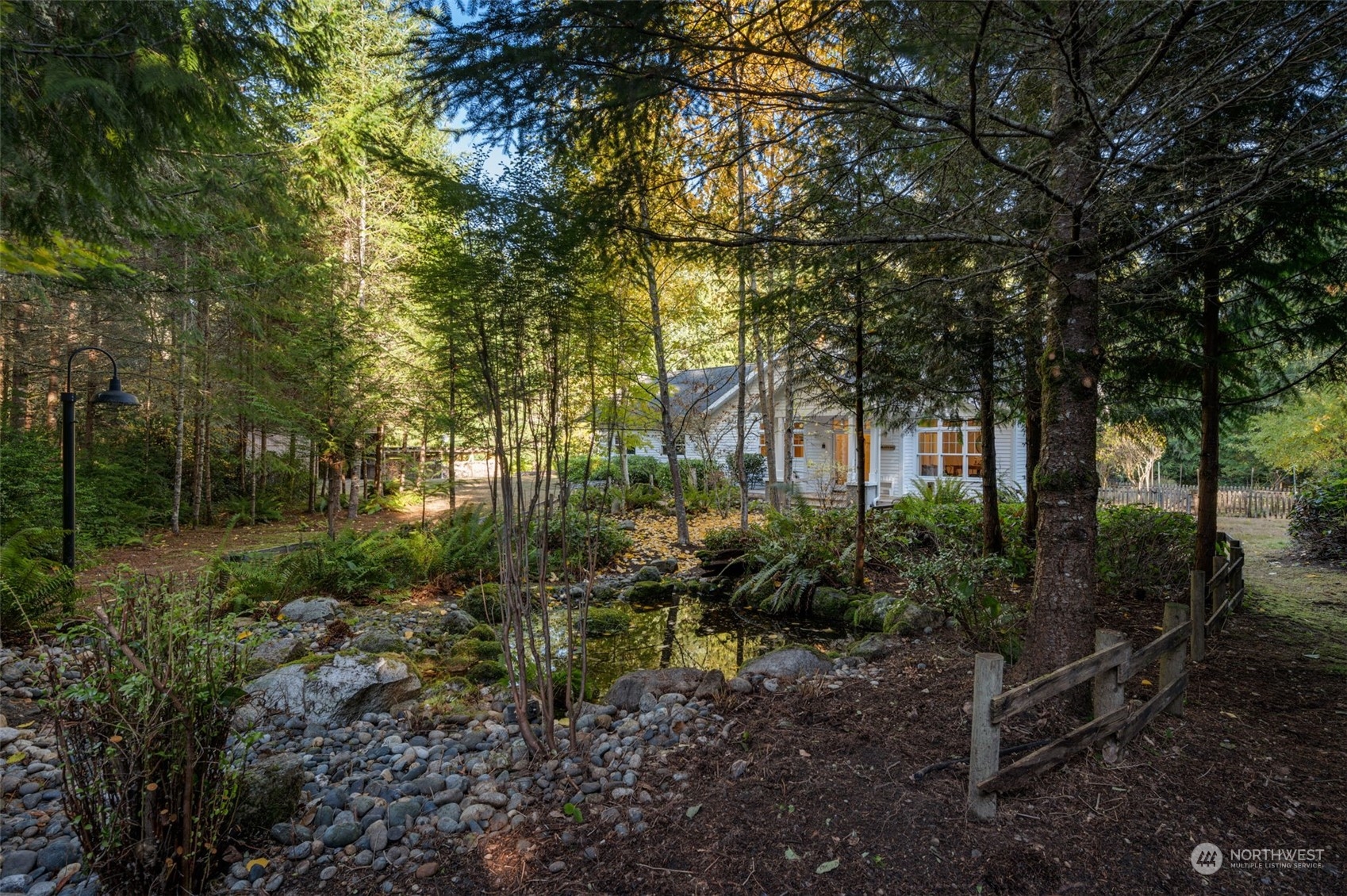 23406 Landers Road Southwest Vashon, WA 98070 - Photo 29 of 39 a backyard of a house with lots of green space