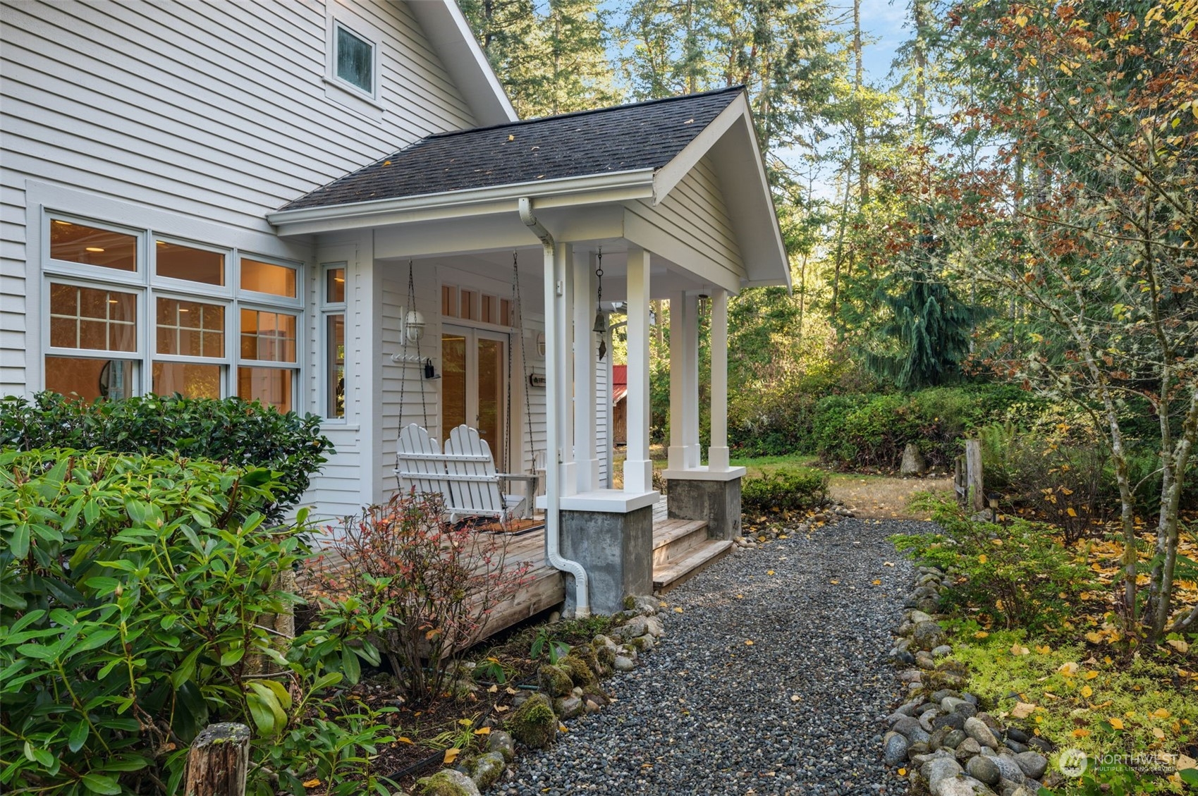 23406 Landers Road Southwest Vashon, WA 98070 - Photo 3 of 39 a view of a house with a yard