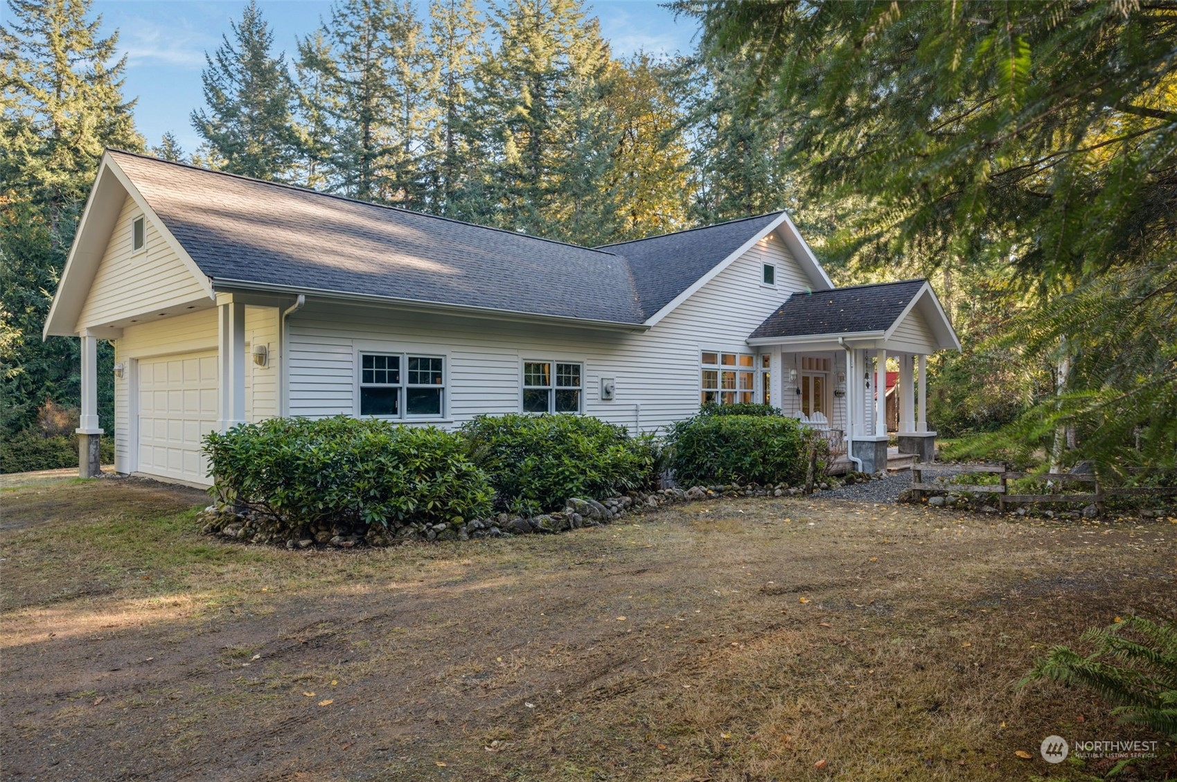 23406 Landers Road Southwest Vashon, WA 98070 - Photo 31 of 39 a front view of a house with a garden