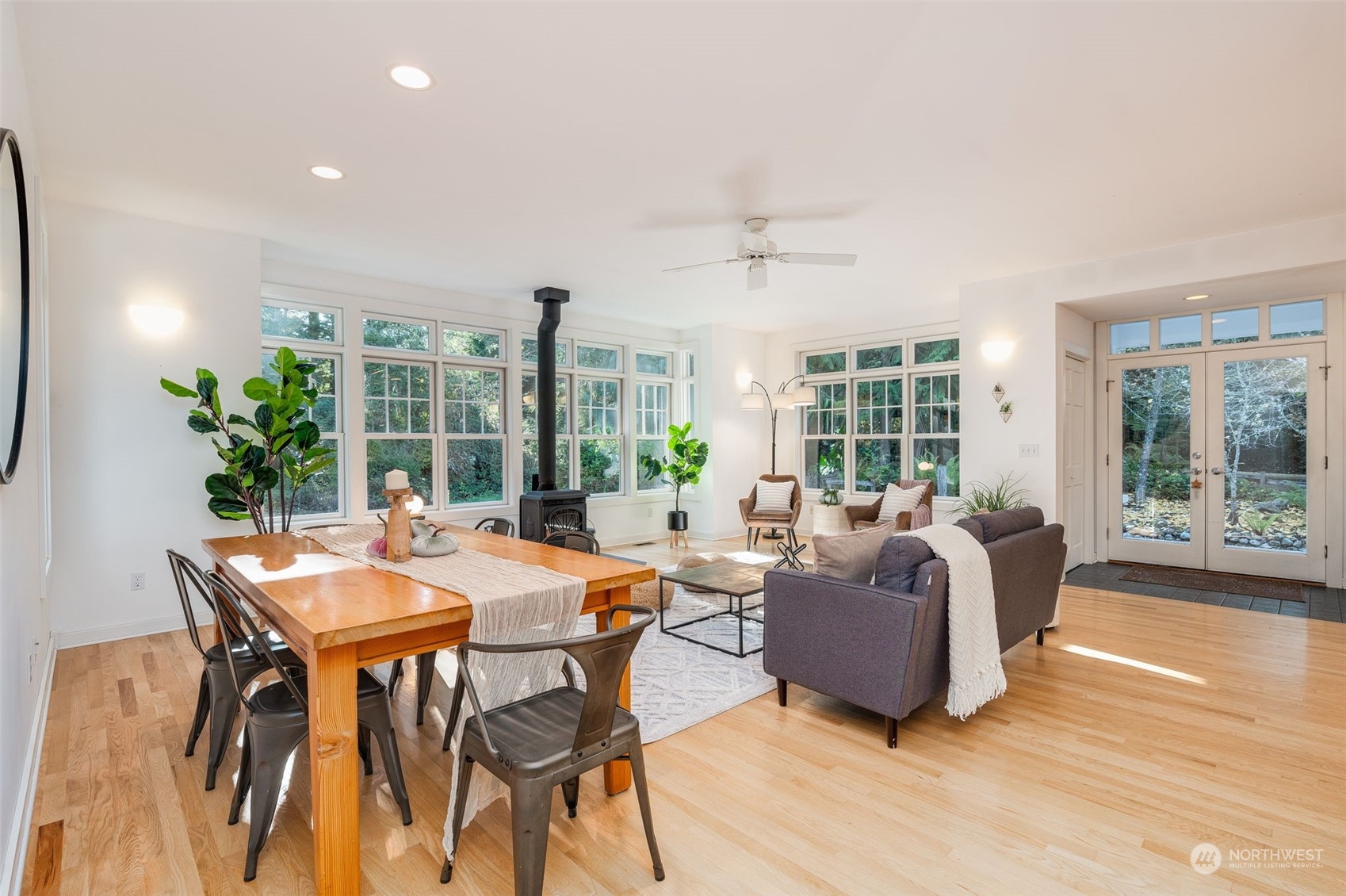 23406 Landers Road Southwest Vashon, WA 98070 - Photo 4 of 39 a view of a dining room with furniture window and wooden floor