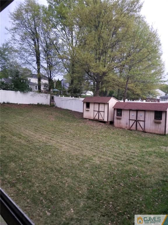 18 Hill Road Edison, NJ 08817 - Photo 13 of 13 a view of a house with backyard and sitting area