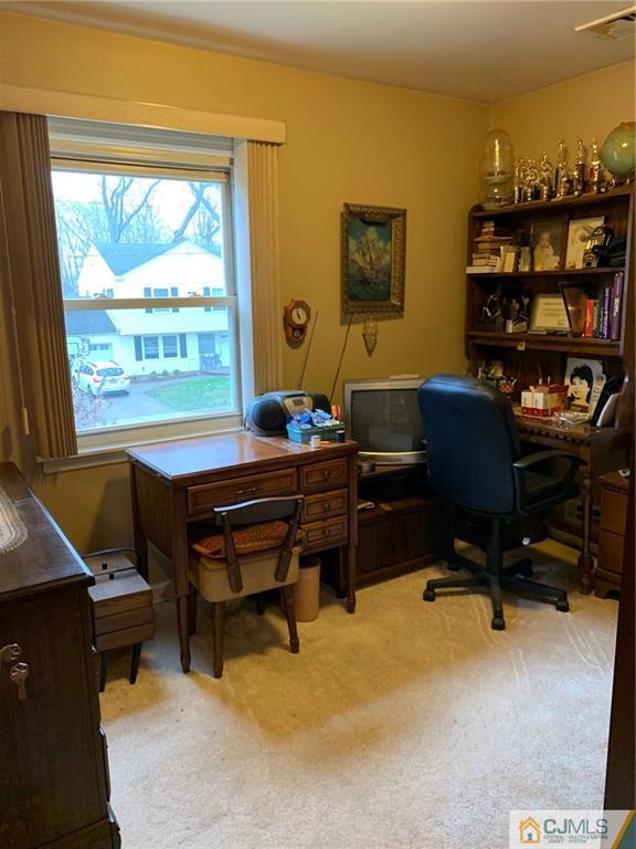 18 Hill Road Edison, NJ 08817 - Photo 5 of 13 a room with furniture pool table and a window