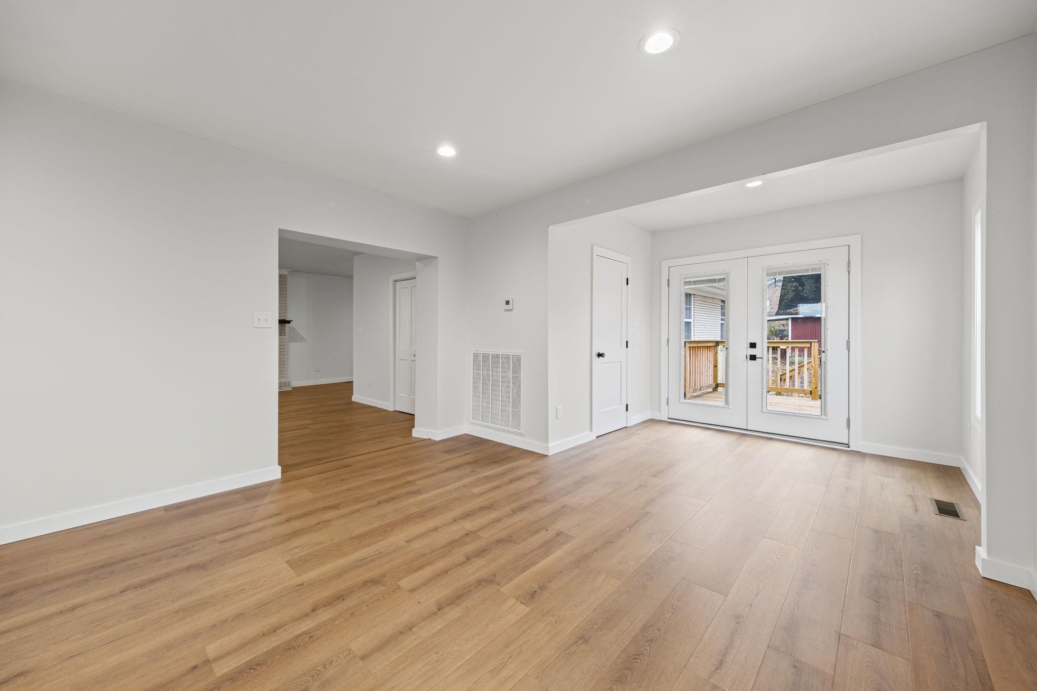 835 Curve Woodville Road Gates, TN 38037 - Photo 6 of 30 Dining room featuring light wood finished floors, french doors, and recessed lighting