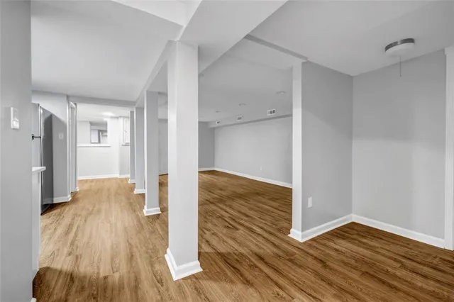a view of livingroom with hardwood floor and hallway