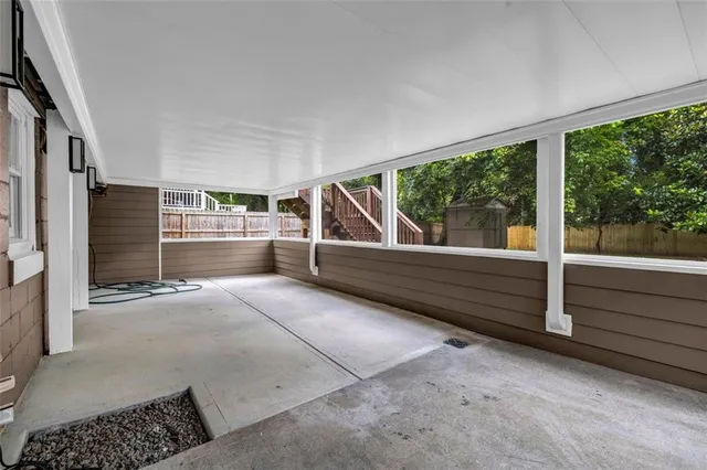 a backyard of a house with lots of green space