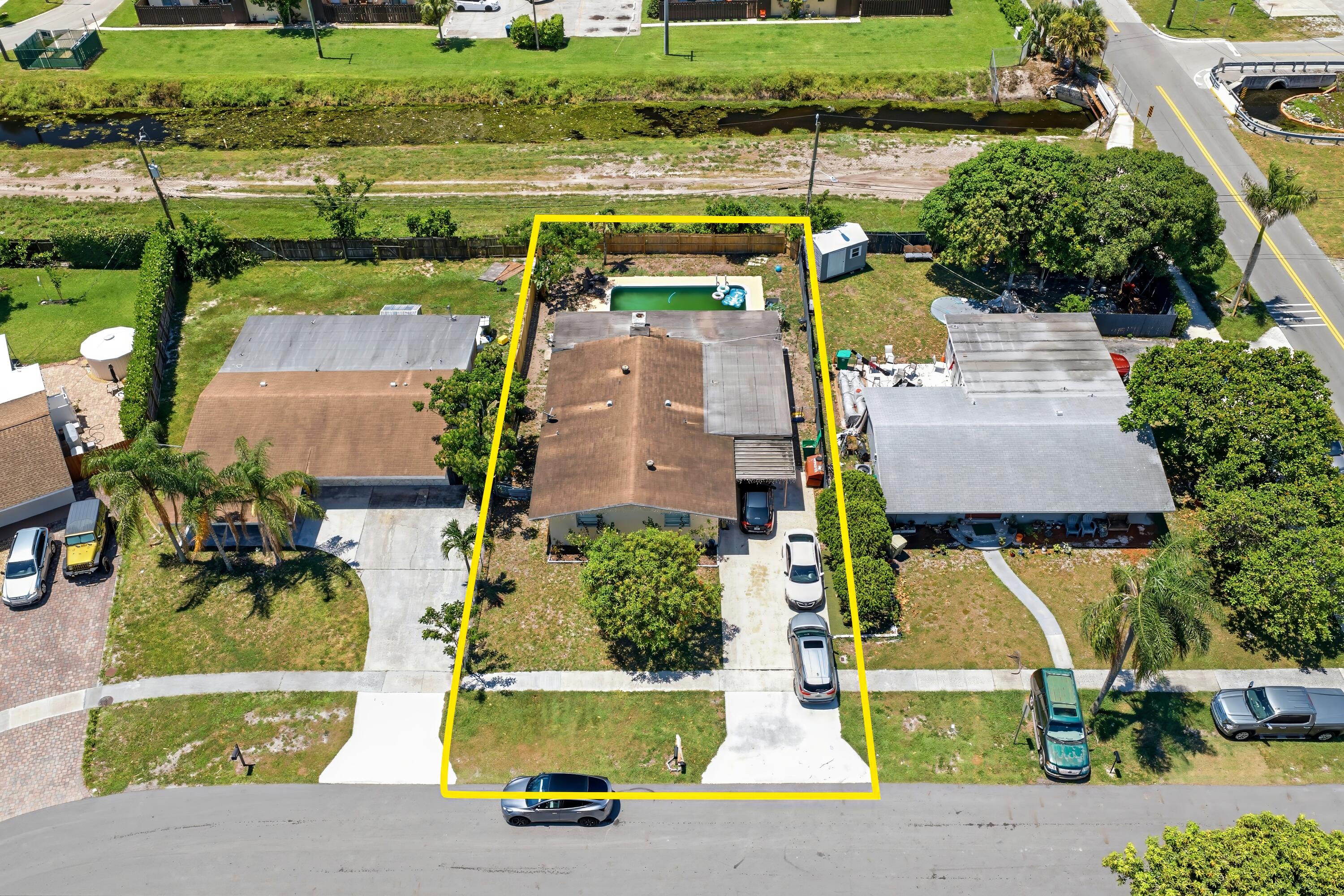 18 Andros Road Palm Springs, FL 33461 - Photo 1 of 20 20260623-DJI_20260622121633_0084_D
