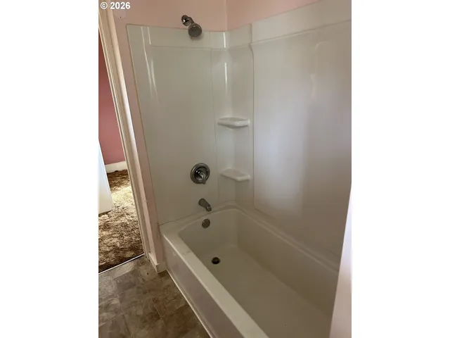 a bathroom with a bathtub