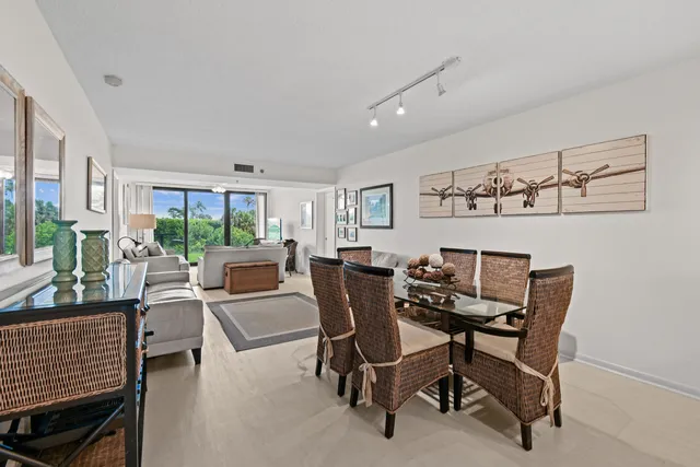 a view of a livingroom with furniture and a window