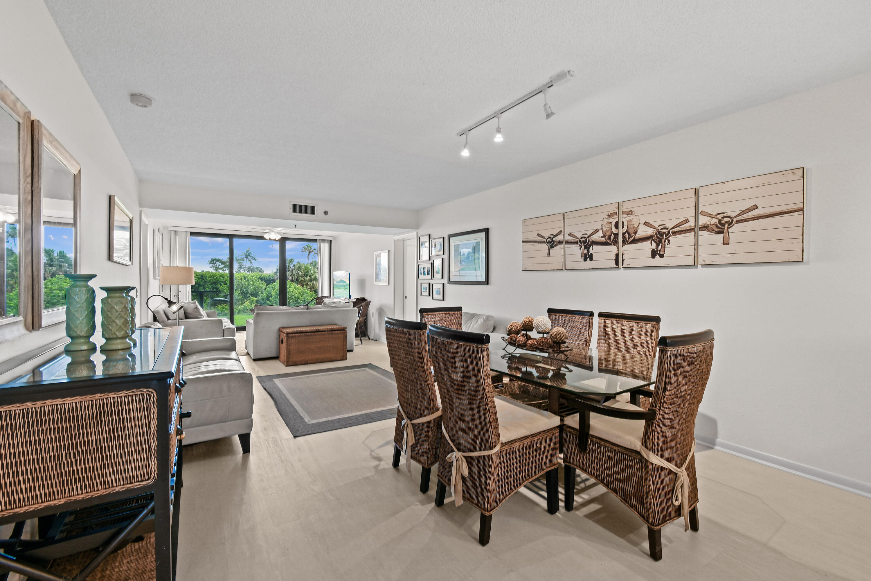 a view of a livingroom with furniture and a window