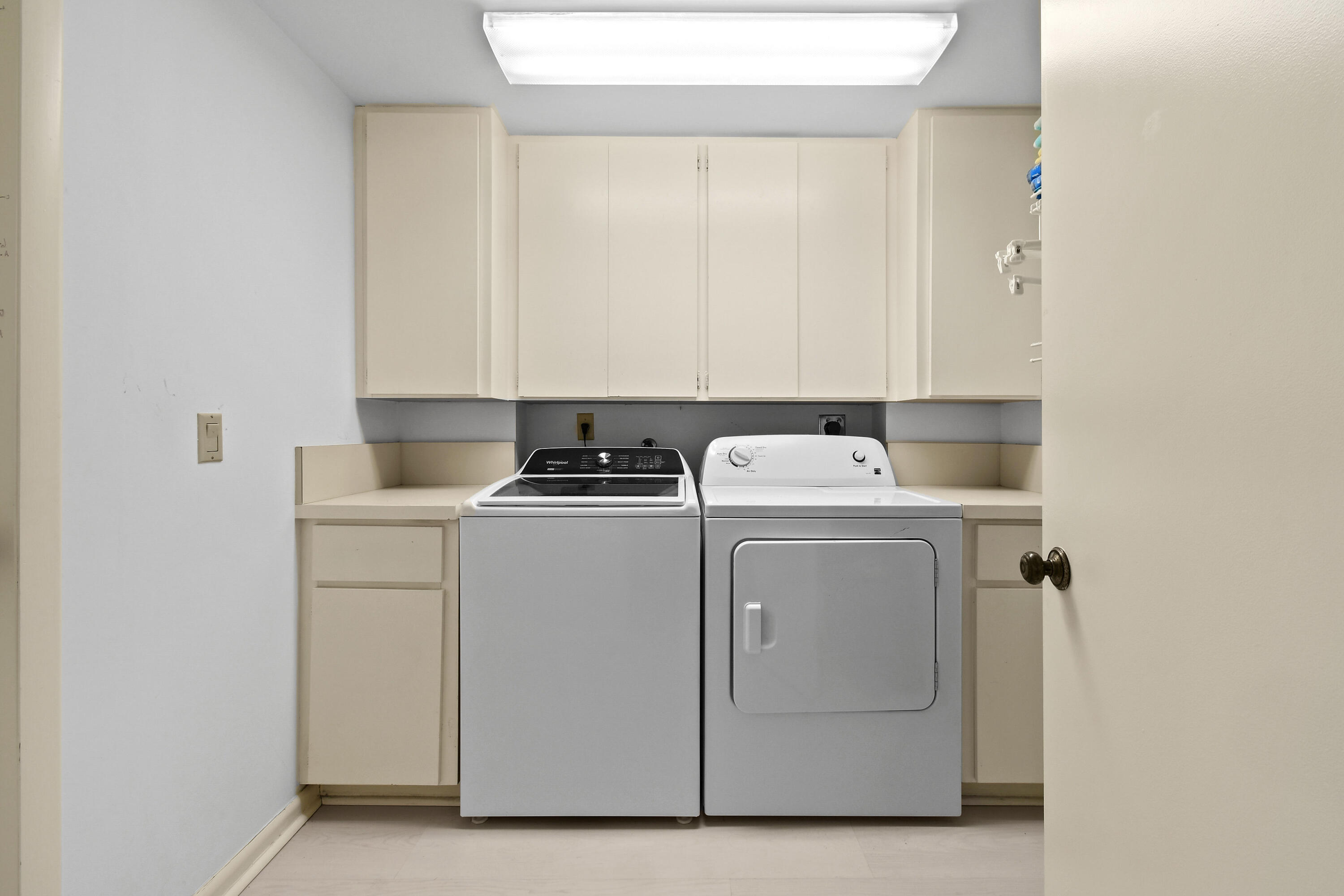 Undisclosed Address Jupiter, FL 33477 - Photo 15 of 23 a utility room with dryer and washer