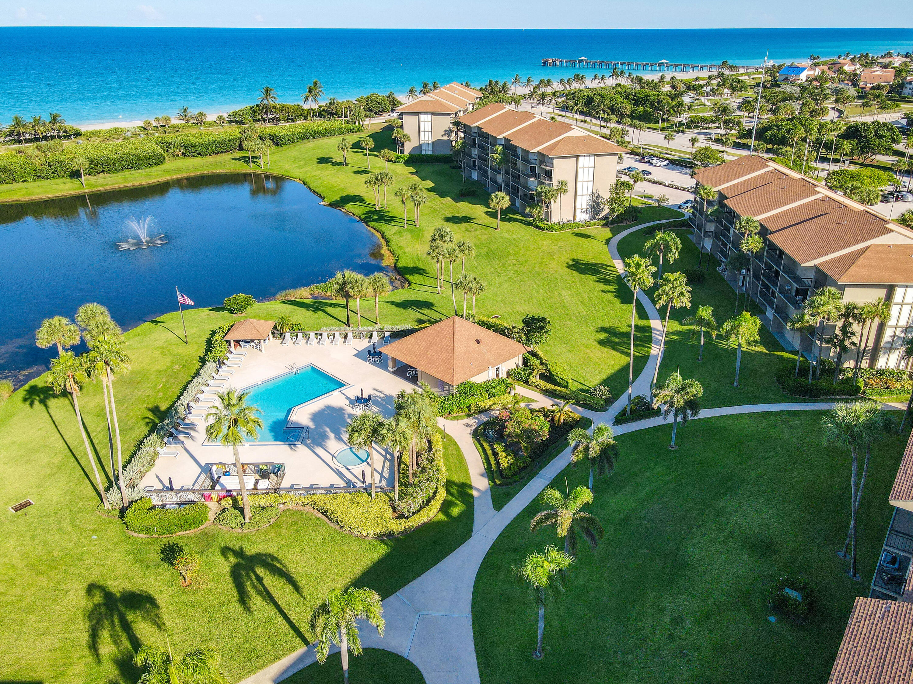 Undisclosed Address Jupiter, FL 33477 - Photo 21 of 23 a view of a swimming pool with a yard