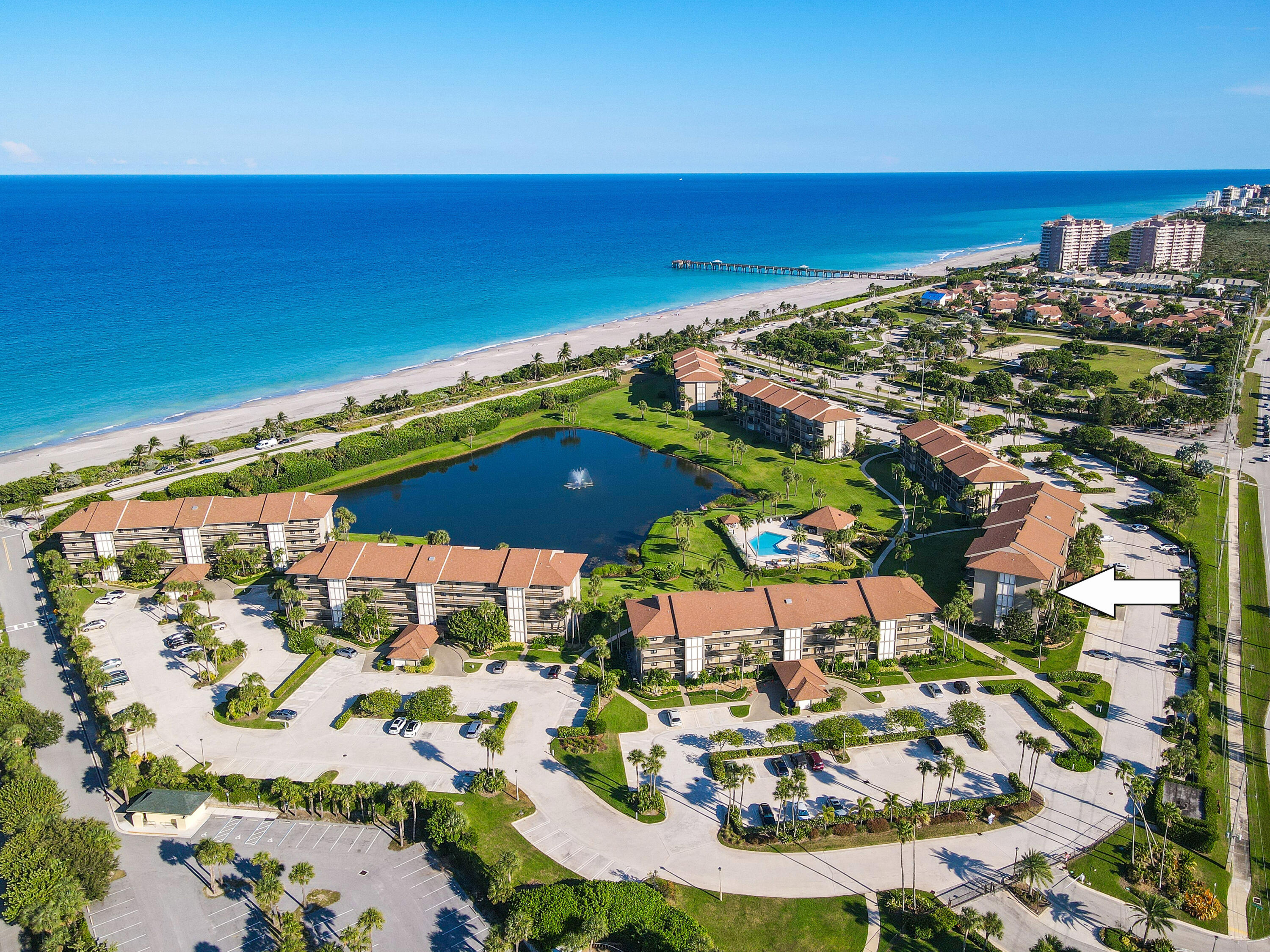 Undisclosed Address Jupiter, FL 33477 - Photo 22 of 23 an aerial view of residential houses with outdoor space