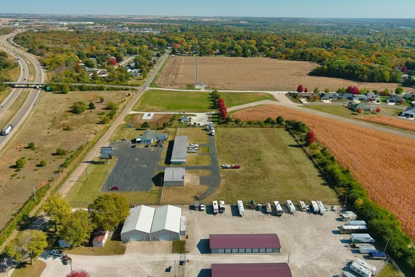 an aerial view of a houses with outdoor space
