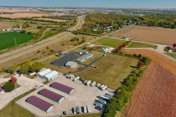 an aerial view of residential houses with outdoor space