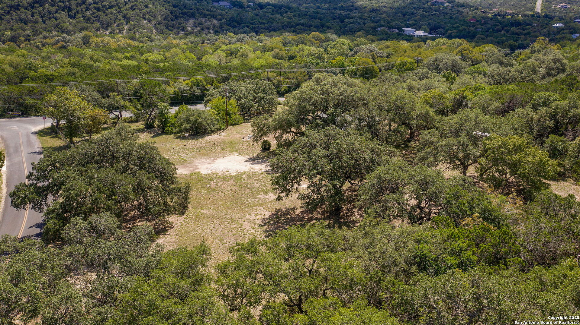 10096 Whip O Will Way Helotes, TX 78023 - Photo 15 of 39 a view of a yard with plants
