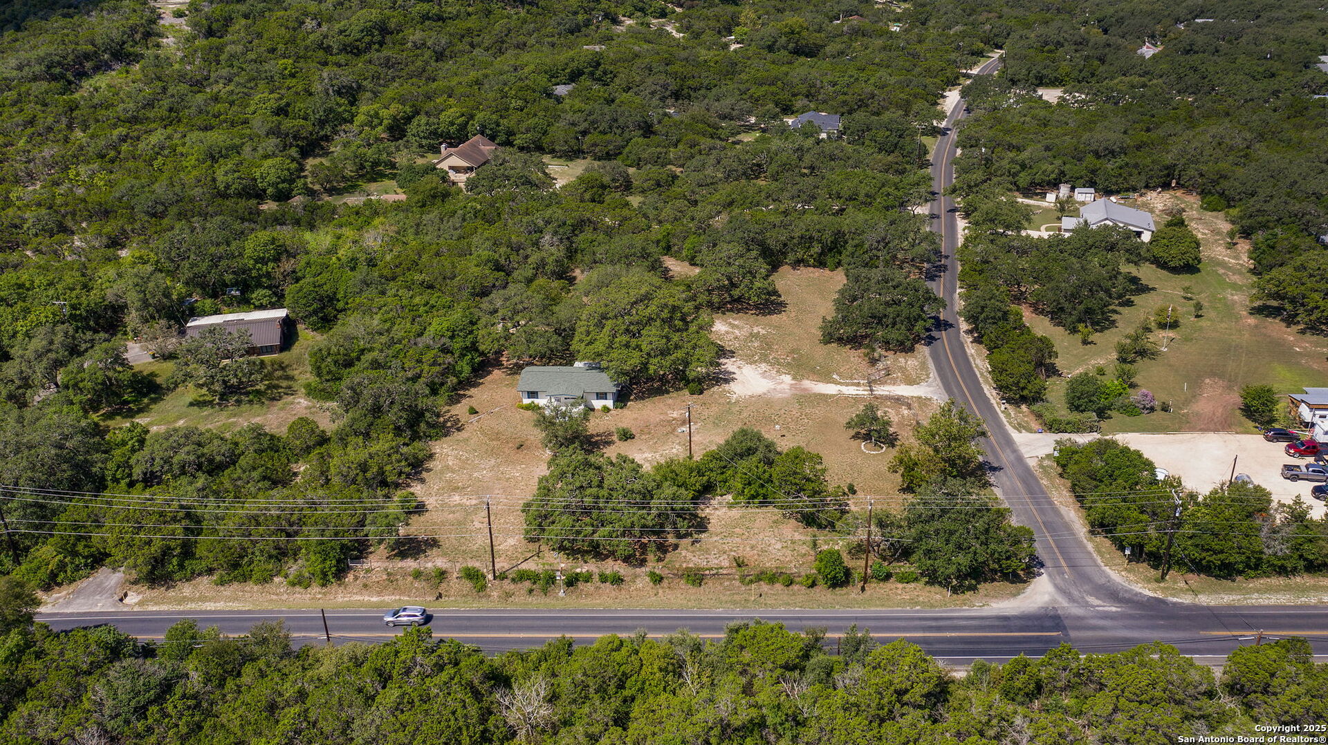10096 Whip O Will Way Helotes, TX 78023 - Photo 2 of 39 a view of a yard with an outdoor space