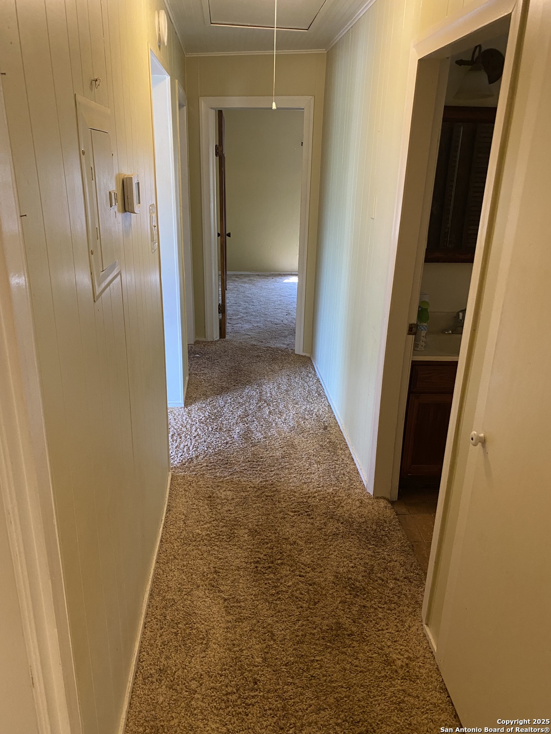 10096 Whip O Will Way Helotes, TX 78023 - Photo 31 of 39 a view of hallway with wooden floor