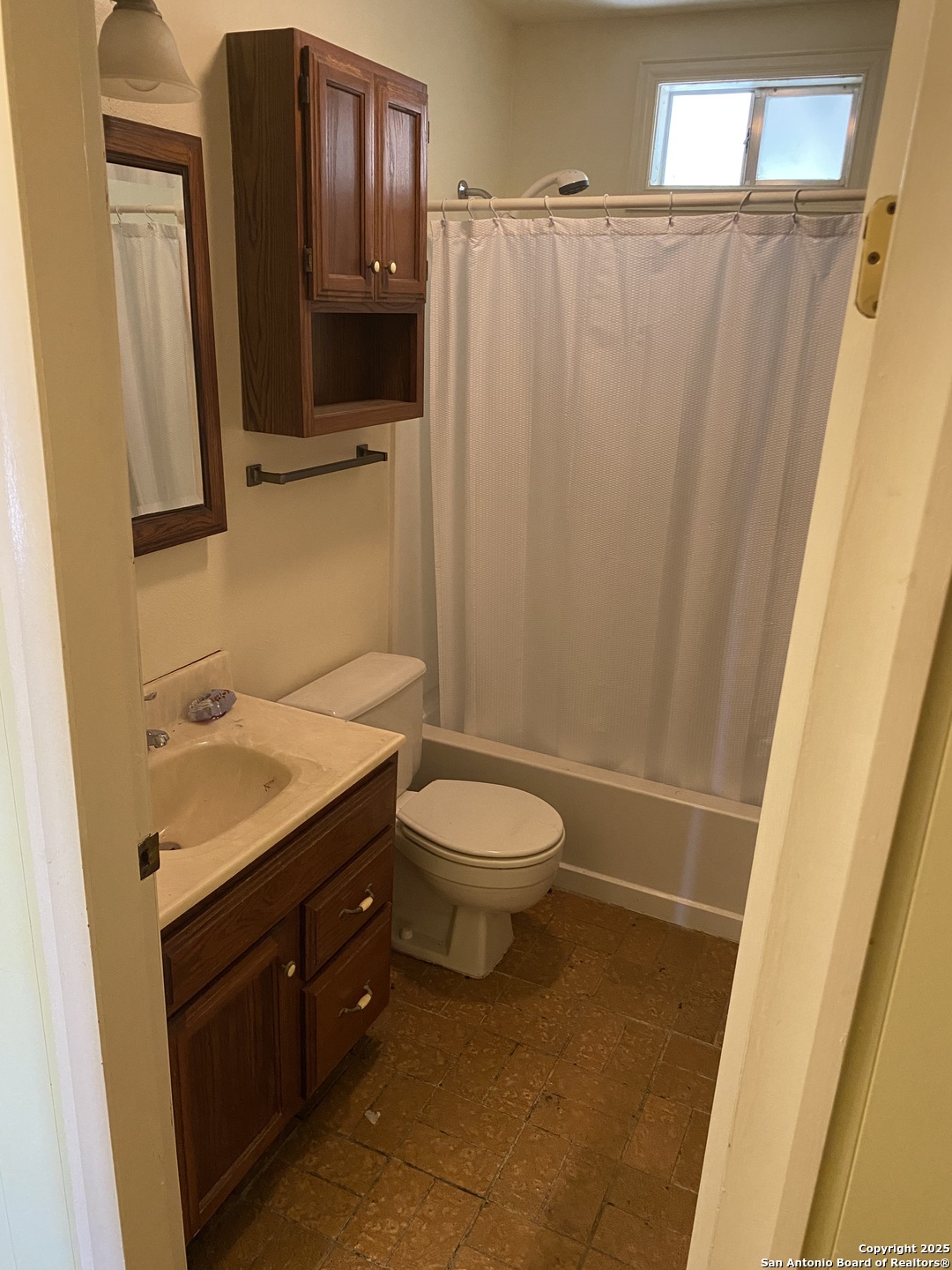 10096 Whip O Will Way Helotes, TX 78023 - Photo 32 of 39 a bathroom with a granite countertop sink toilet and shower