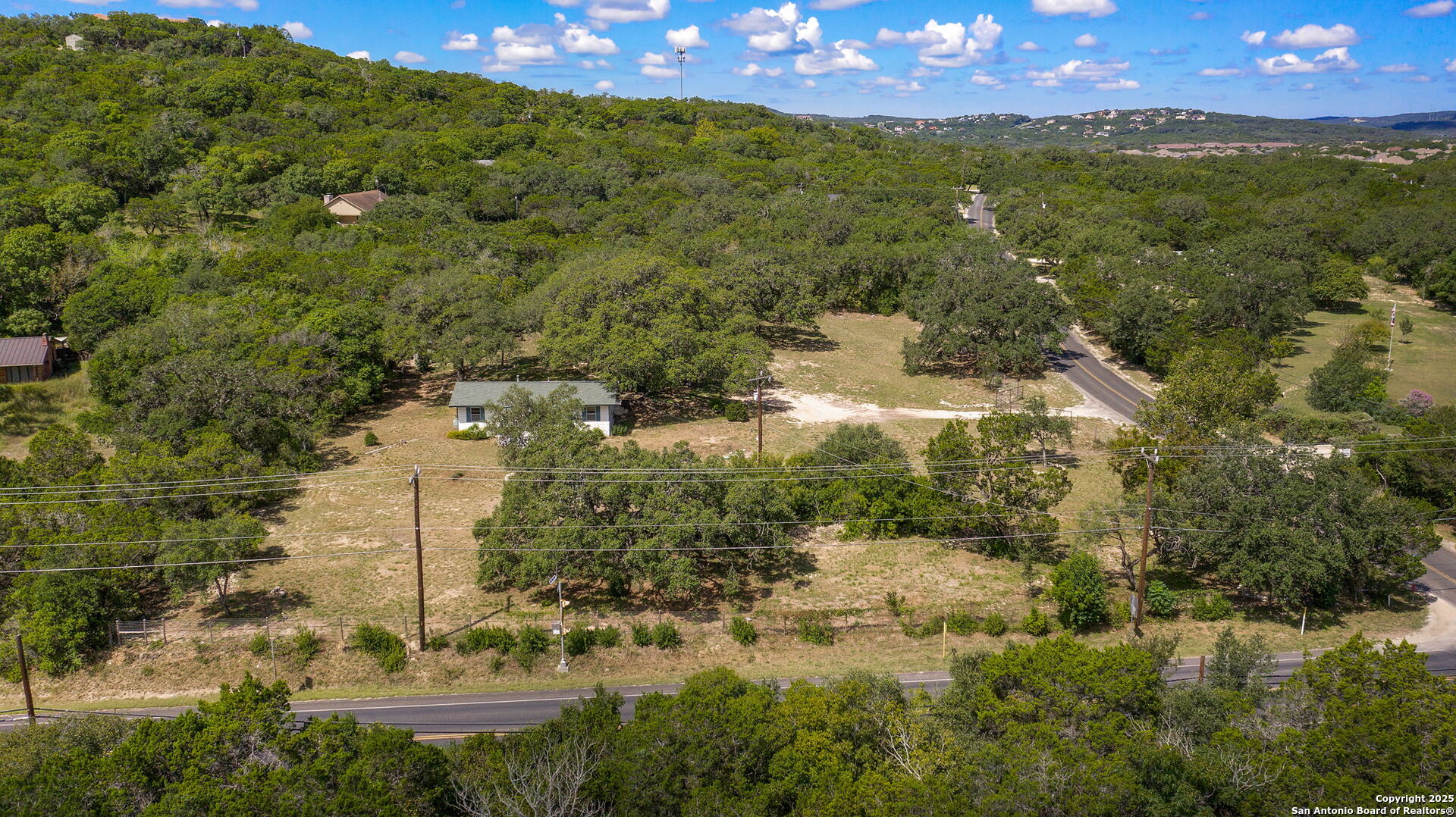 10096 Whip O Will Way Helotes, TX 78023 - Photo 6 of 39 a view of a city