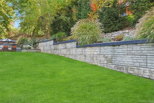 a view of back yard with green space