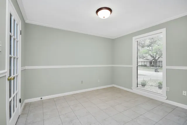 a view of a kitchen with a sink and a window