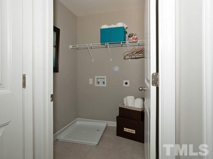 3021 Bluegrove Road, Unit 153 Raleigh, NC 27610 - Photo 22 of 25 a bathroom with a sink and mirror