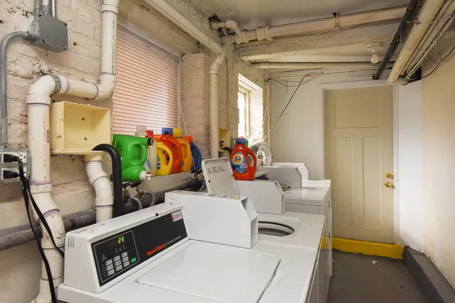 a utility room with washer and dryer