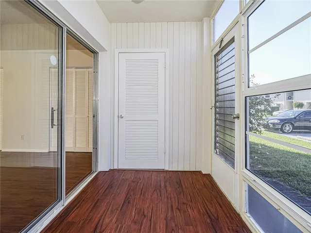 an aerial view of a house with a swimming pool yard and outdoor seating
