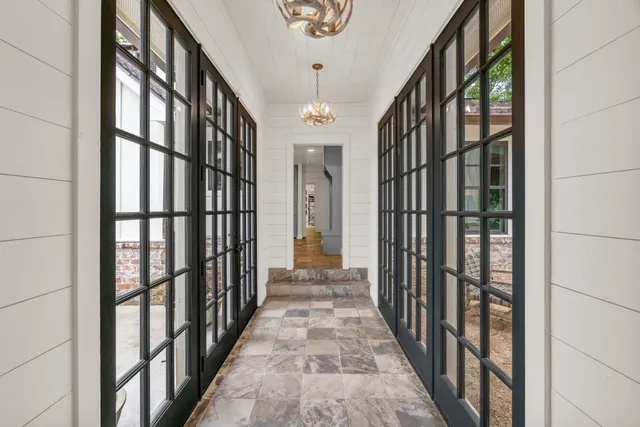 a view of staircase with lots of windows