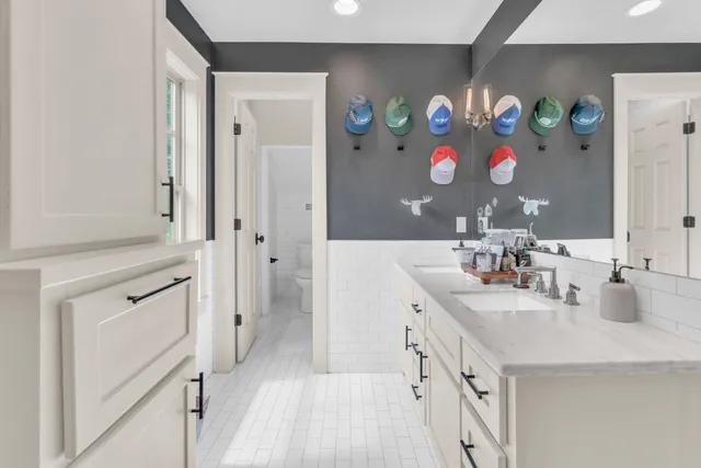 a bed room with a bed and a chandelier