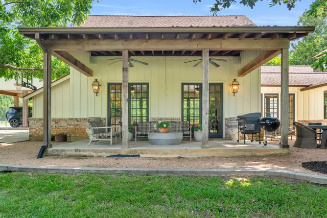 a view of outdoor space with a garden and trees