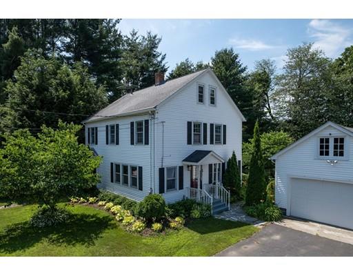 72 Spring Street Northampton, MA 01062 - Photo 1 of 39 a front view of a house with a yard and trees