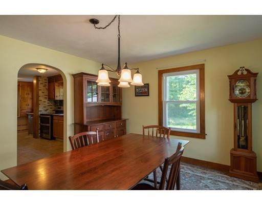 72 Spring Street Northampton, MA 01062 - Photo 11 of 39 a view of a livingroom with furniture window and wooden floor