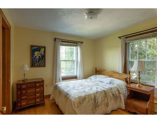 72 Spring Street Northampton, MA 01062 - Photo 20 of 39 a bedroom with a bed and a window