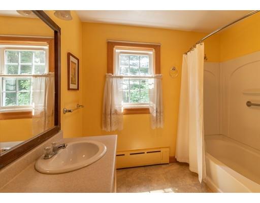 72 Spring Street Northampton, MA 01062 - Photo 22 of 39 a bathroom with a sink and a mirror