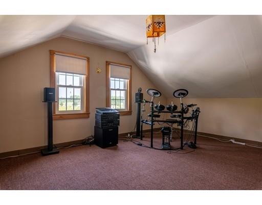 72 Spring Street Northampton, MA 01062 - Photo 26 of 39 a view of a livingroom with furniture and a window