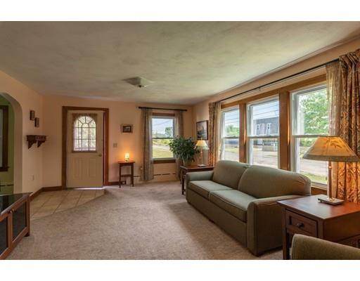 72 Spring Street Northampton, MA 01062 - Photo 8 of 39 a living room with furniture and a flat screen tv