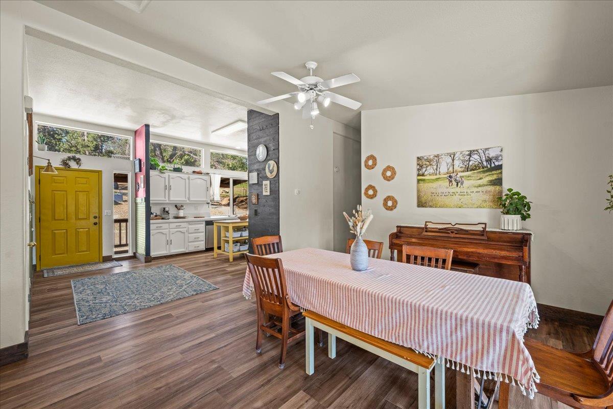 5351 Cosumnes Mine Road Somerset, CA 95684 - Photo 20 of 66 a dining room with furniture and window