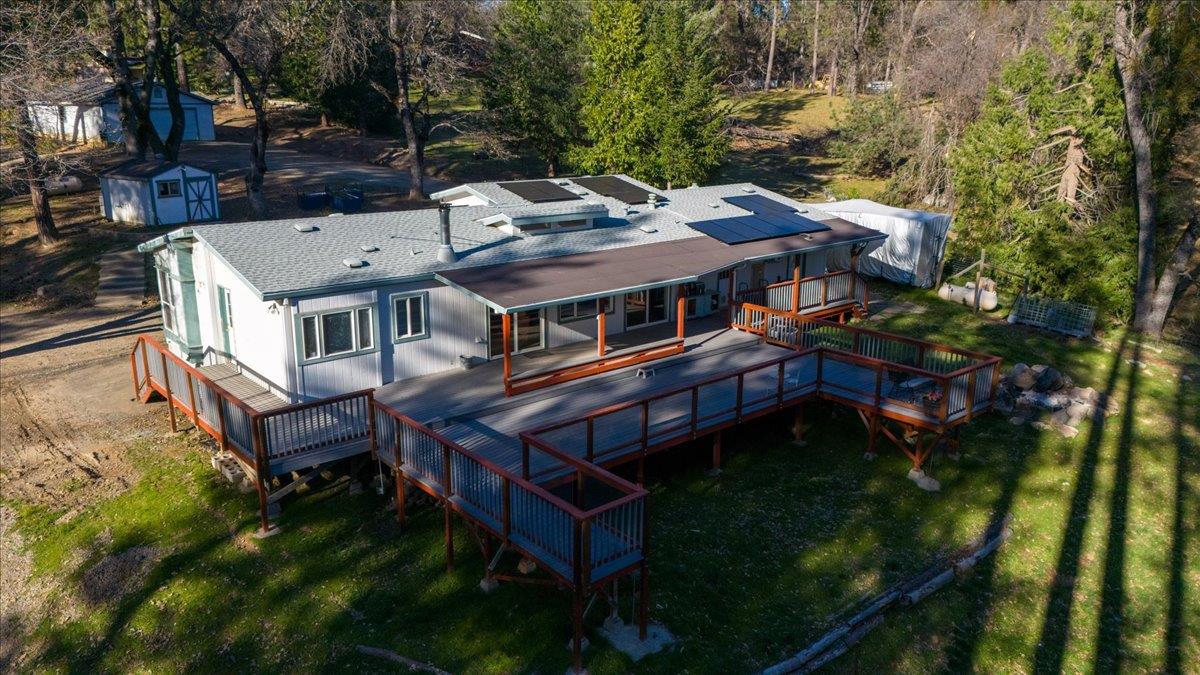 5351 Cosumnes Mine Road Somerset, CA 95684 - Photo 2 of 66 an aerial view of a house with a yard table and chairs