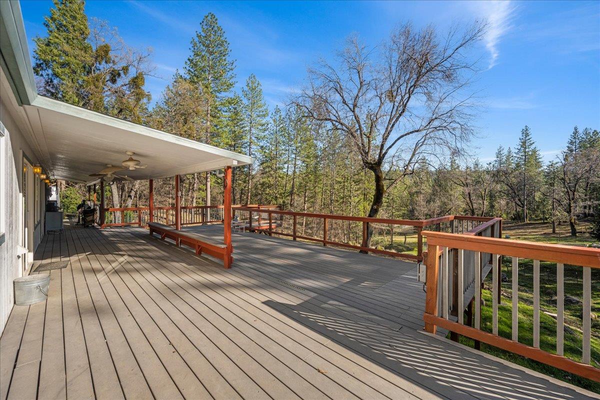 5351 Cosumnes Mine Road Somerset, CA 95684 - Photo 3 of 66 a view of a balcony with wooden floor and outdoor space