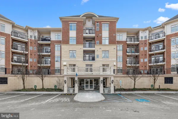 a front view of a building with a street
