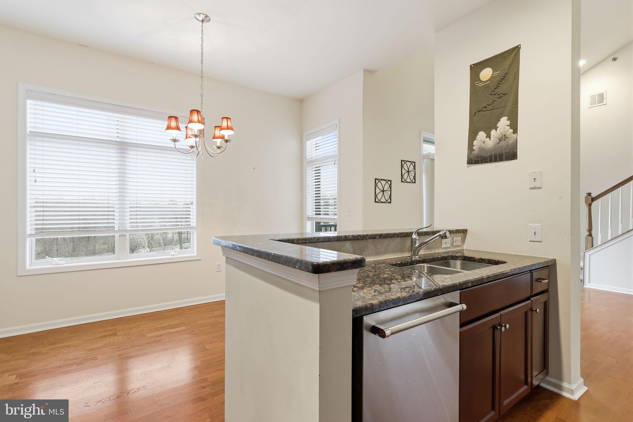 556 Carson Terrace Huntingdon Valley, PA 19006 - Photo 11 of 42 a sink and a table in a room