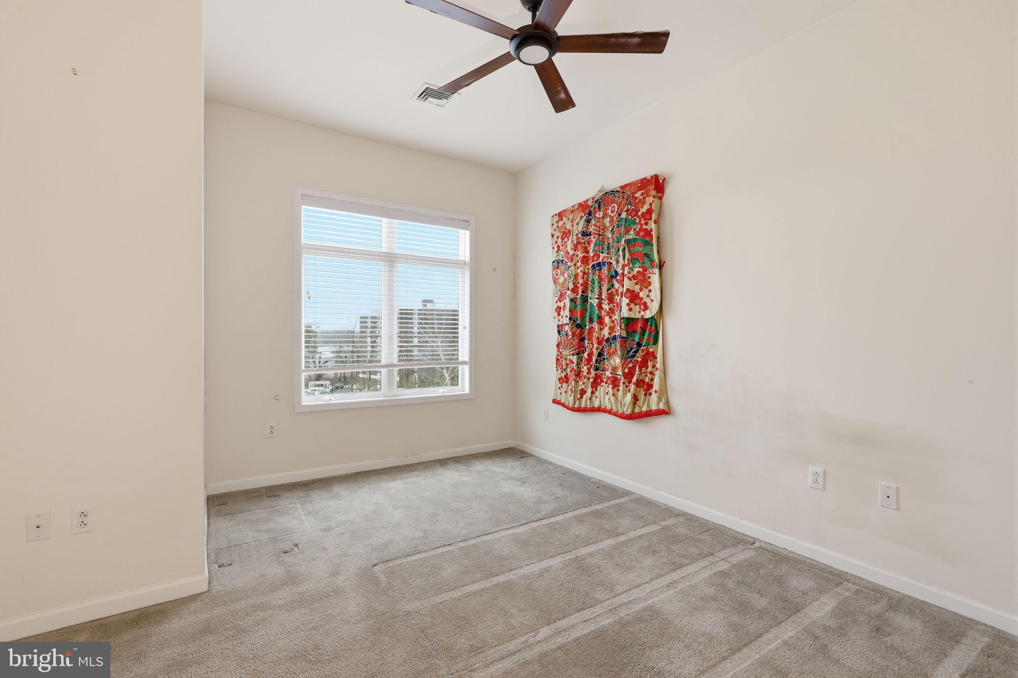 556 Carson Terrace Huntingdon Valley, PA 19006 - Photo 19 of 42 a view of an empty room with a window
