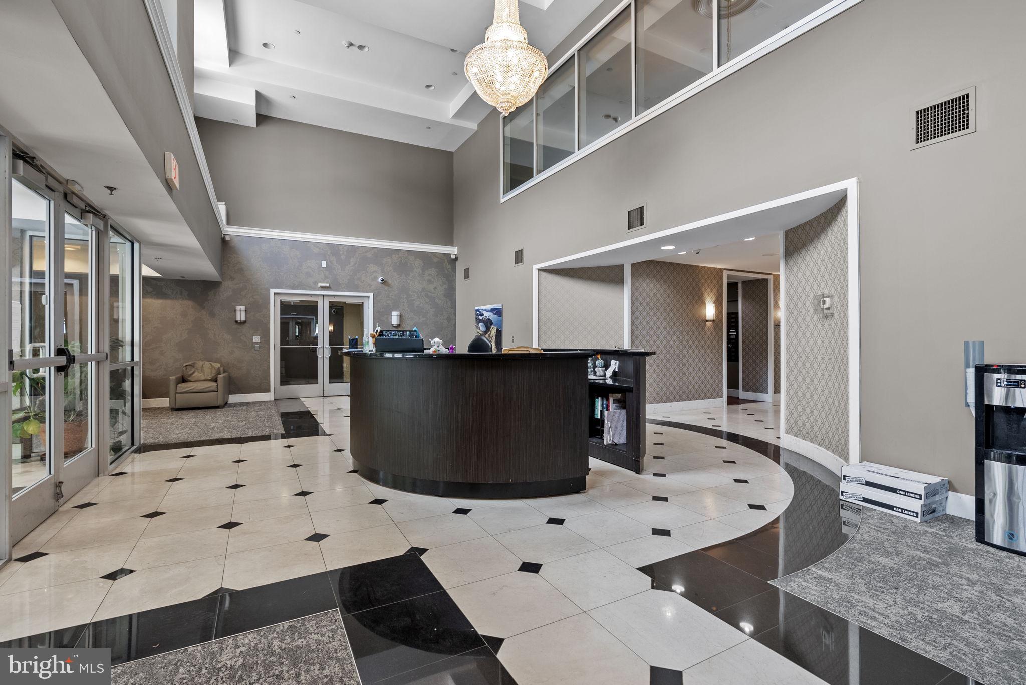 556 Carson Terrace Huntingdon Valley, PA 19006 - Photo 30 of 42 a living room with furniture and a table