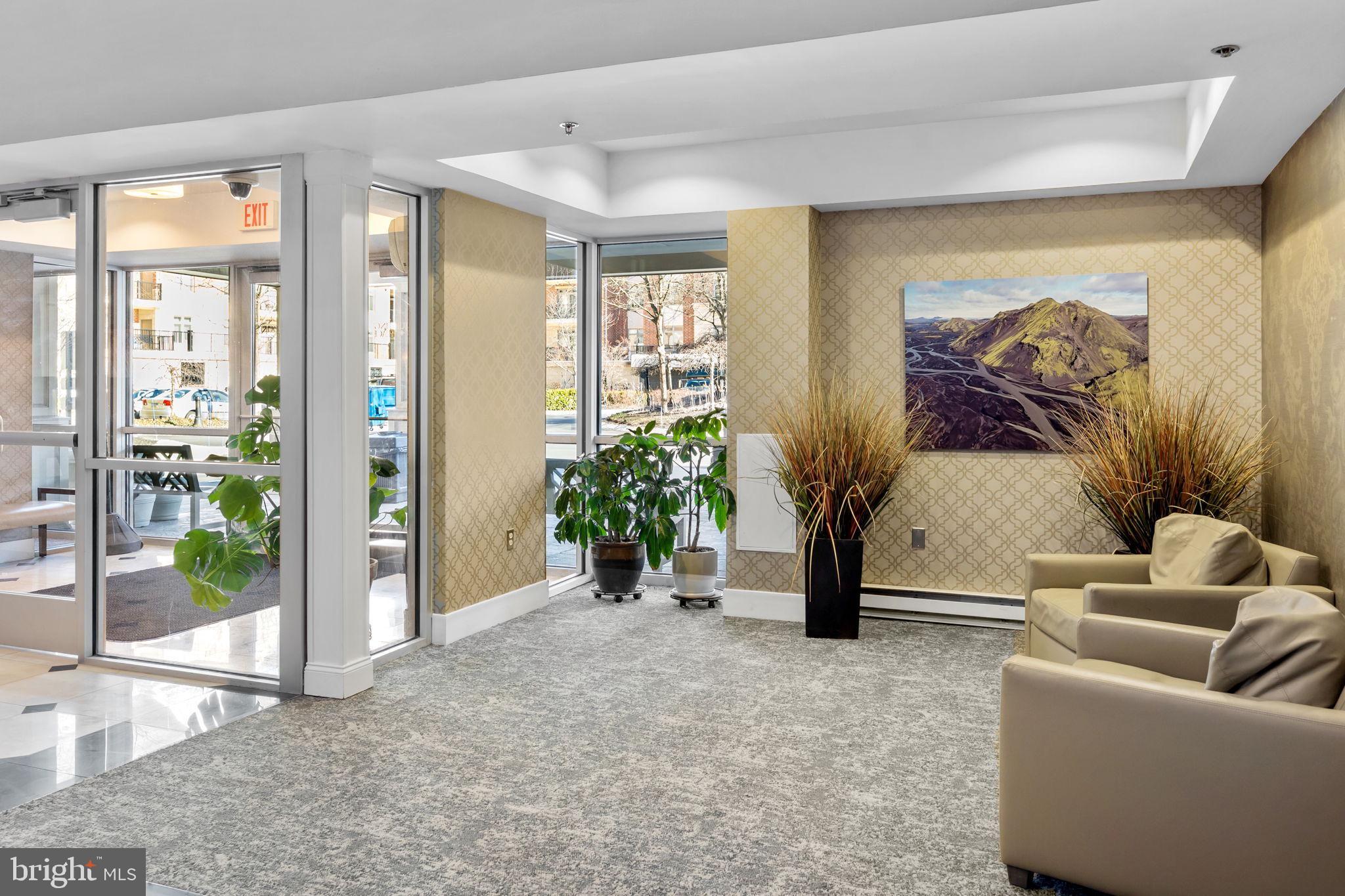 556 Carson Terrace Huntingdon Valley, PA 19006 - Photo 31 of 42 a living room with furniture and a floor to ceiling window