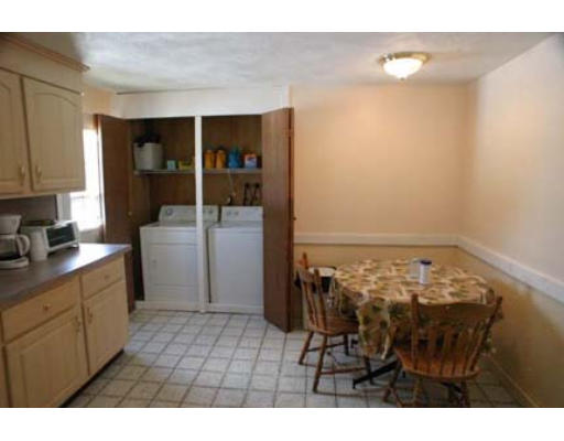 13 Rickey Drive Maynard, MA 01754 - Photo 8 of 15 a kitchen with sink and cabinets