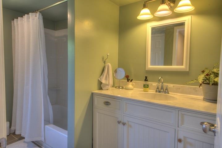 670 Rockfish Road Waynesboro, VA 22980 - Photo 17 of 58 a bathroom with a sink and a mirror