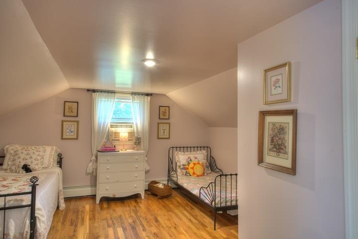 670 Rockfish Road Waynesboro, VA 22980 - Photo 19 of 58 a view of a livingroom with wooden floor and a window